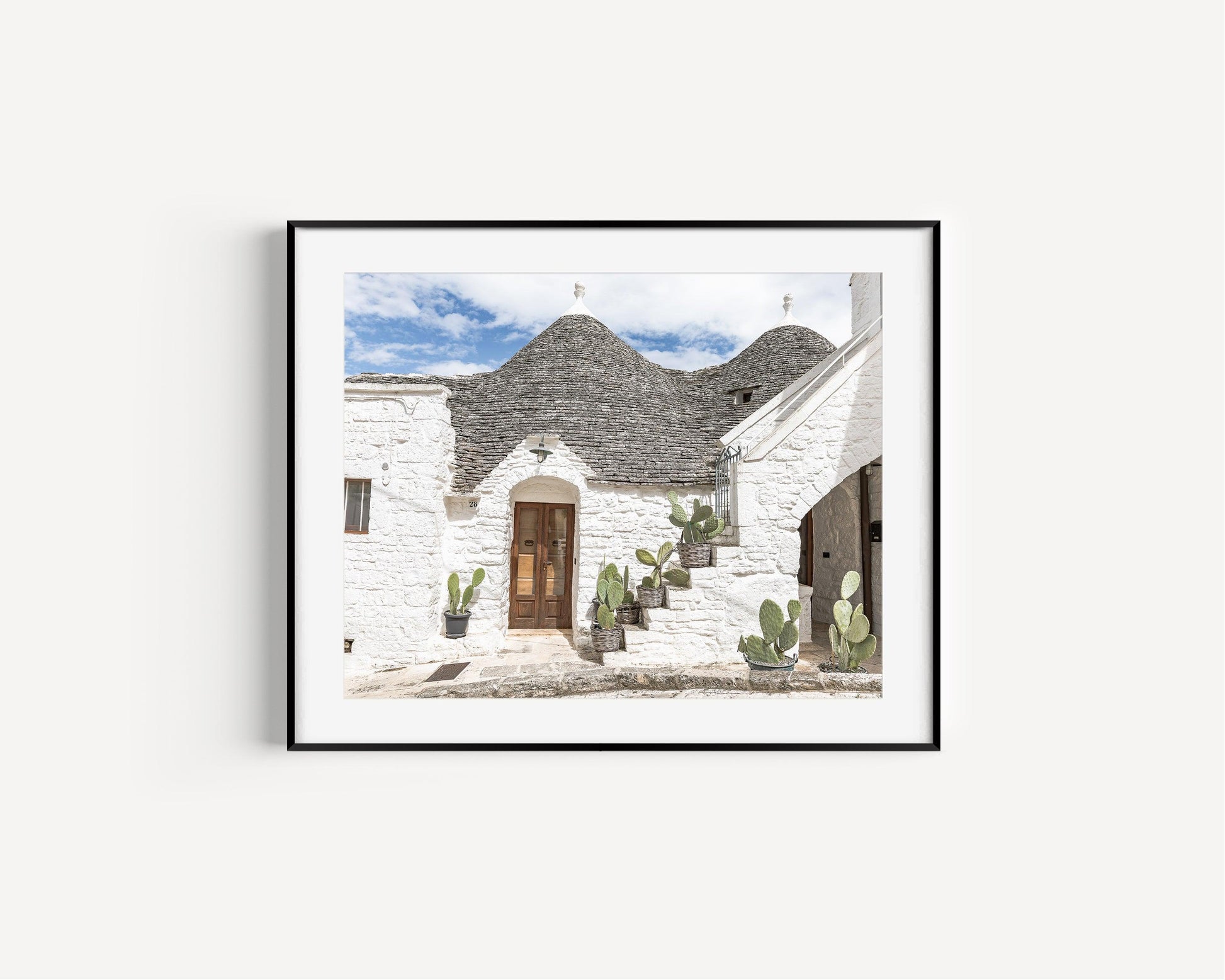 Horizontal photo of trulli rooftops and stone walls in Alberobello, Italy – Mediterranean architectural print