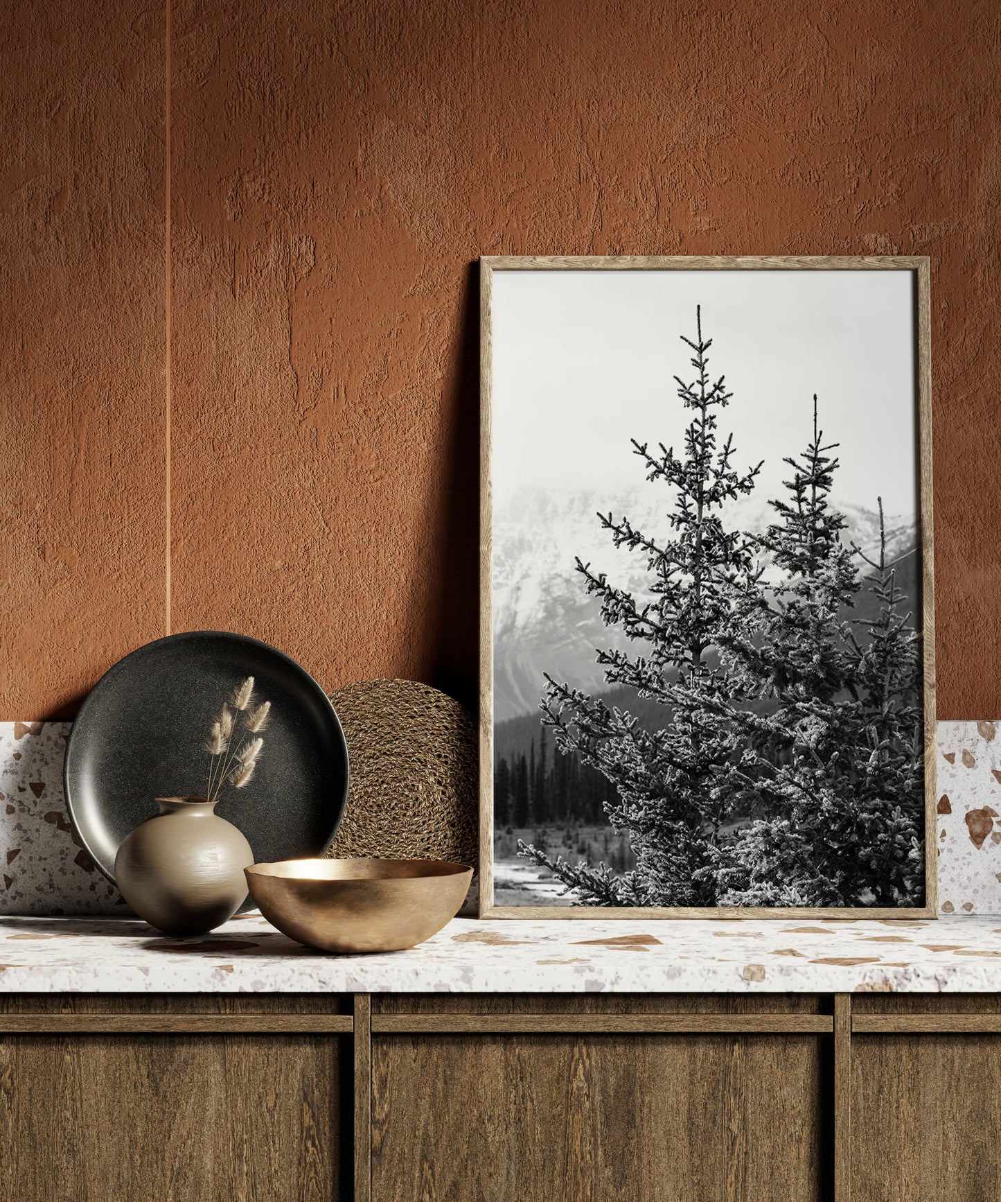 Black and white photo of a pine tree with snow-dusted branches in Banff National Park, Alberta – minimalist Canadian Rockies nature photography.