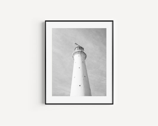 Black and white photo of Gibbs Hill Lighthouse in Bermuda taken from a low angle