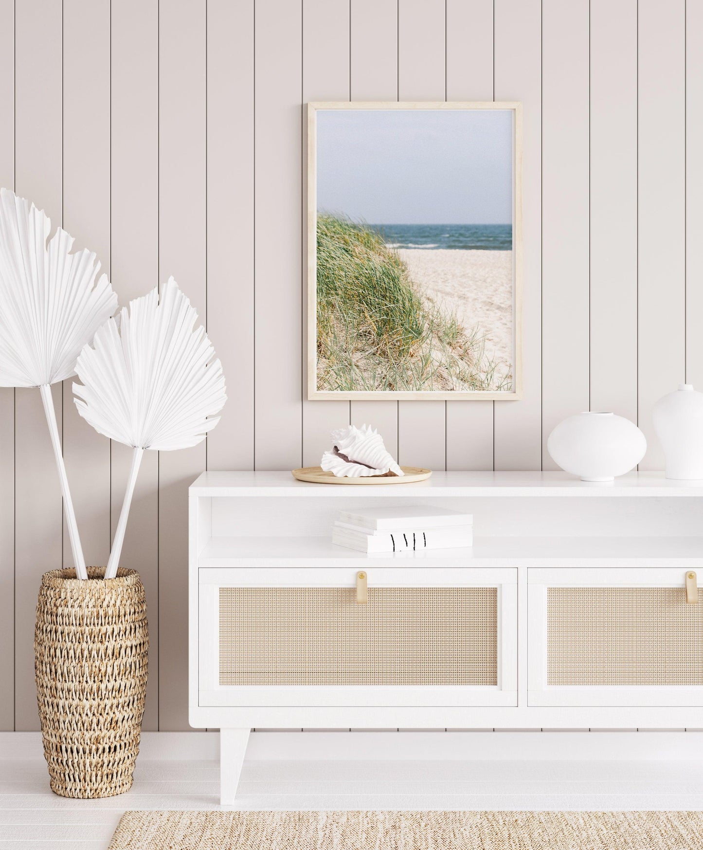 Neutral-toned beach photography of sand dunes and beach grass under a pale sky, evoking a coastal New England feel with a Nantucket aesthetic