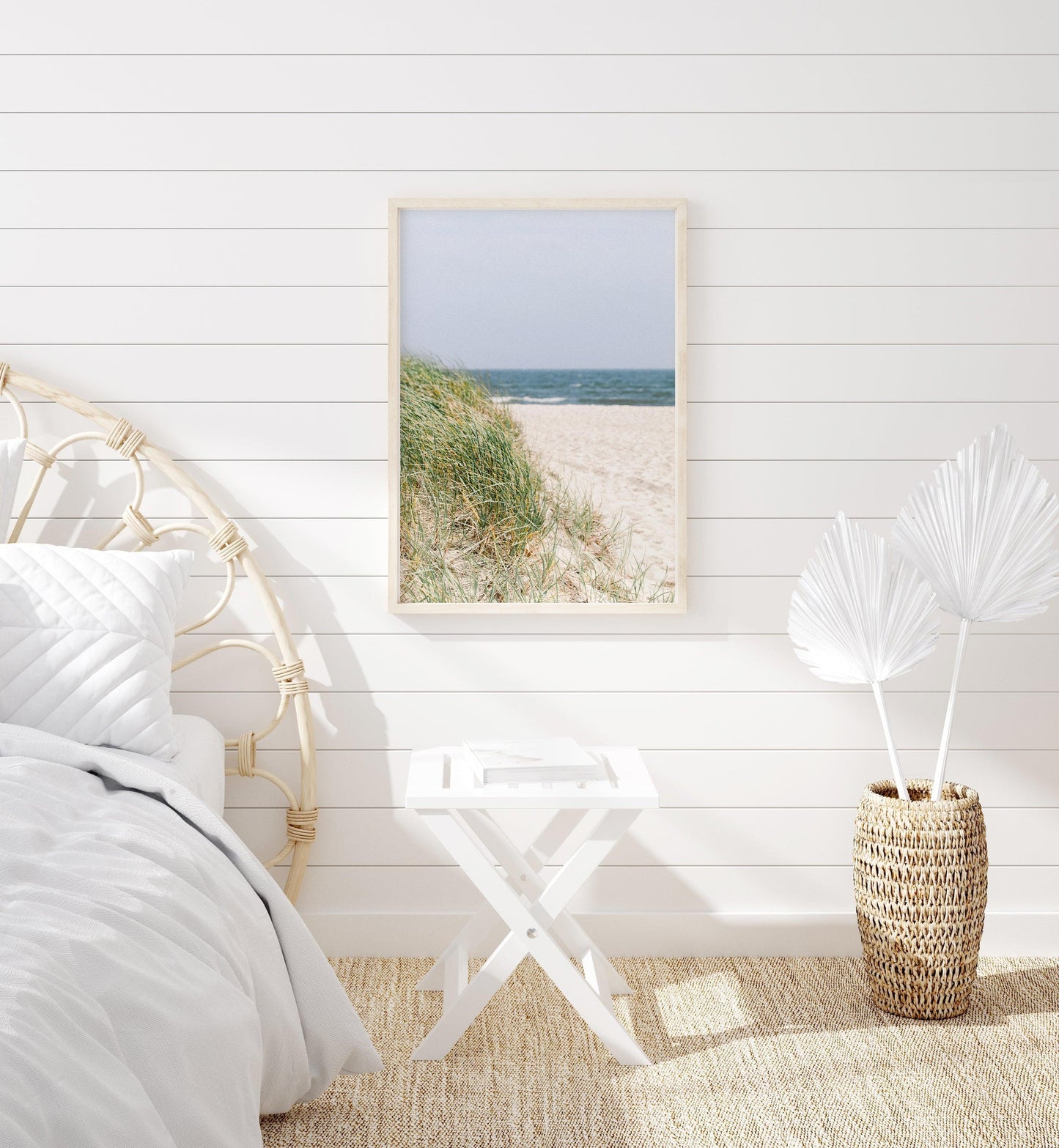 Neutral-toned beach photography of sand dunes and beach grass under a pale sky, evoking a coastal New England feel with a Nantucket aesthetic
