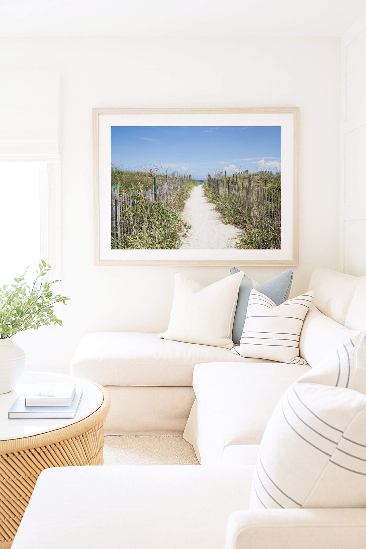 Sandy beach path winding through seagrass under a blue sky, inspired by coastal New England beaches