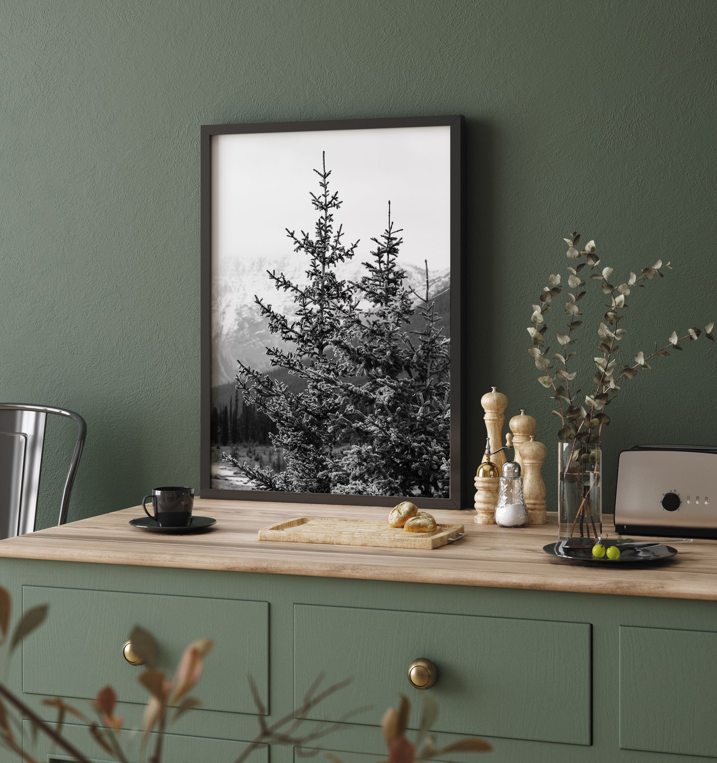 Black and white photo of a pine tree with snow-dusted branches in Banff National Park, Alberta – minimalist Canadian Rockies nature photography.