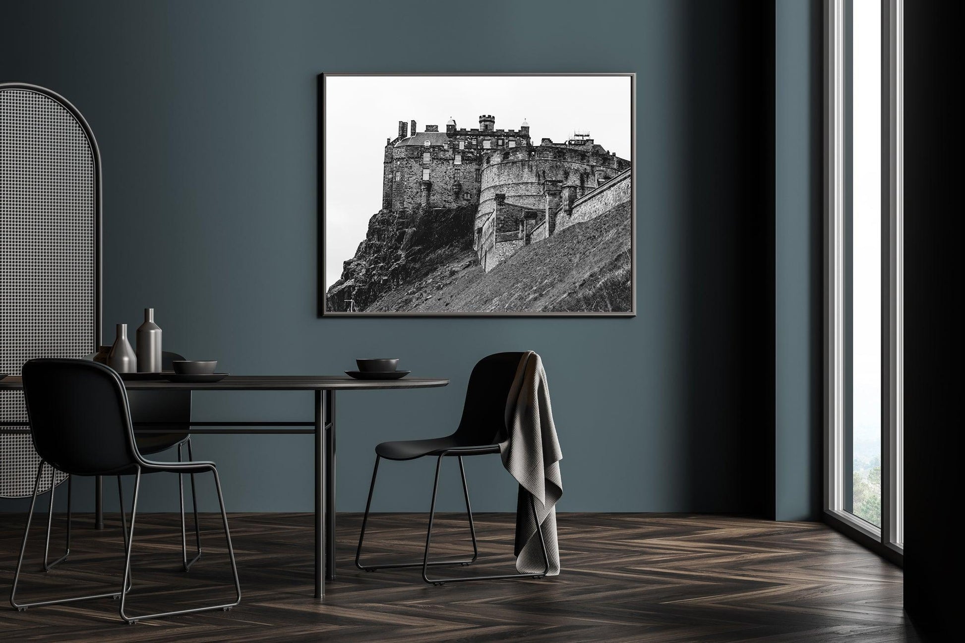 Black and white horizontal photo of Edinburgh Castle in Scotland with stone ramparts and cliffside – moody historic wall art