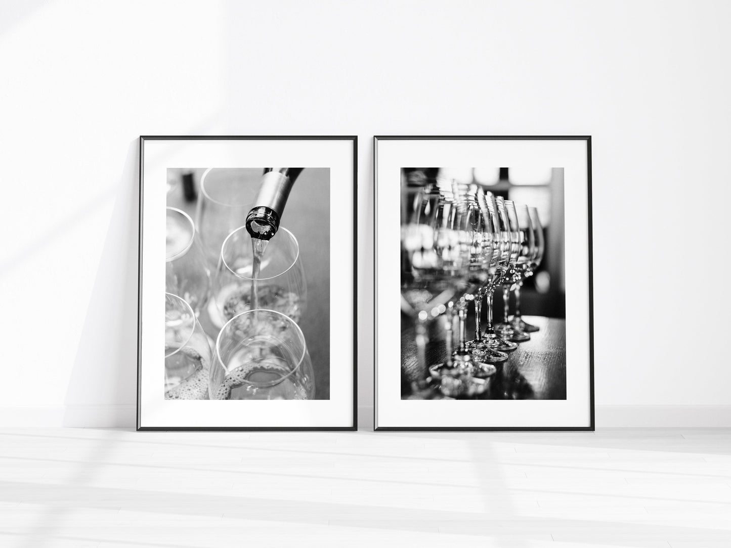Black and white photograph of wine being poured into glasses at a Napa Valley winery tasting – wine wall art print
