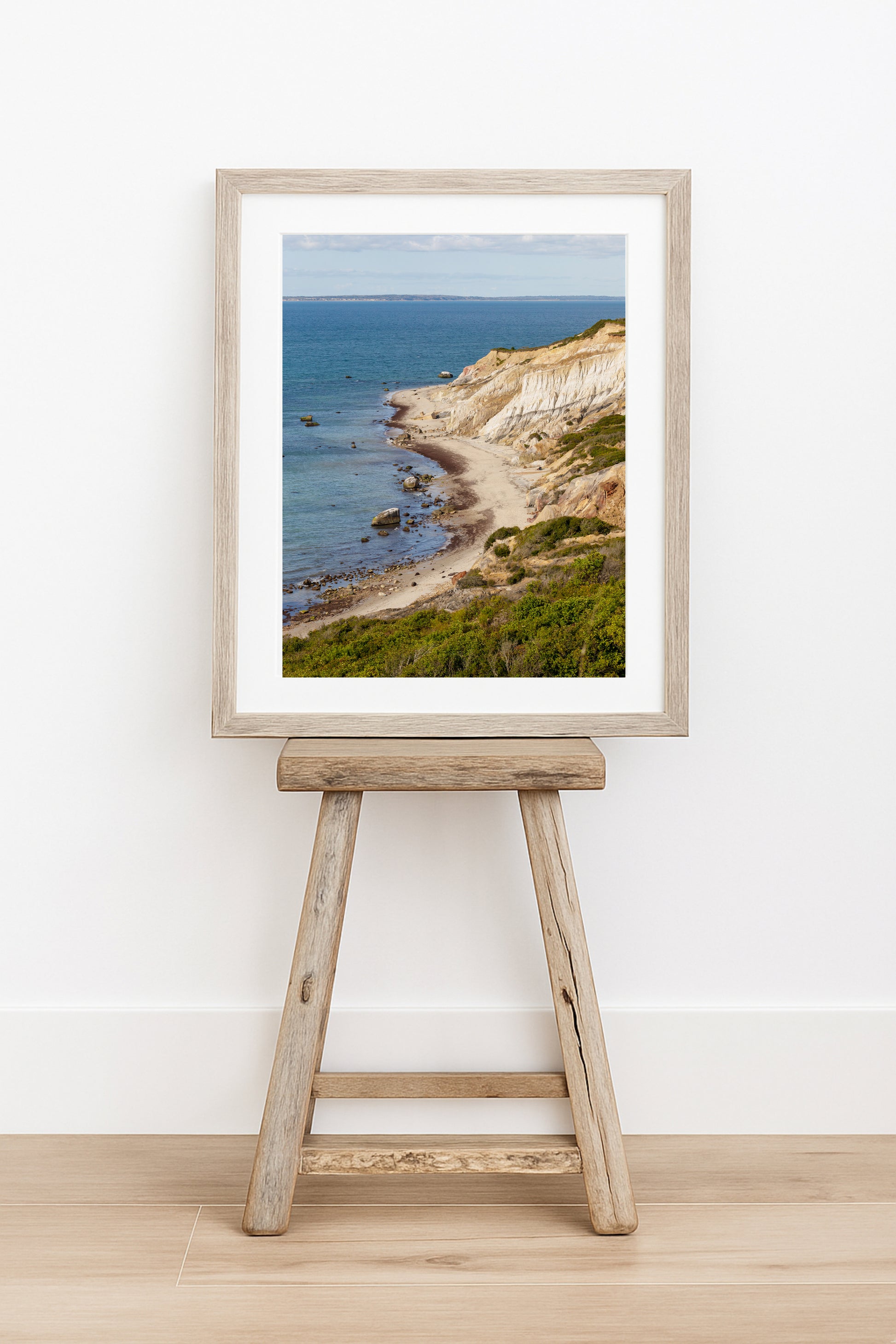 Aerial beach photography of the Aquinnah Cliffs in Aquinnah Massachusetts, showing a sweeping ocean seascape along the coastline of Martha’s Vineyard.