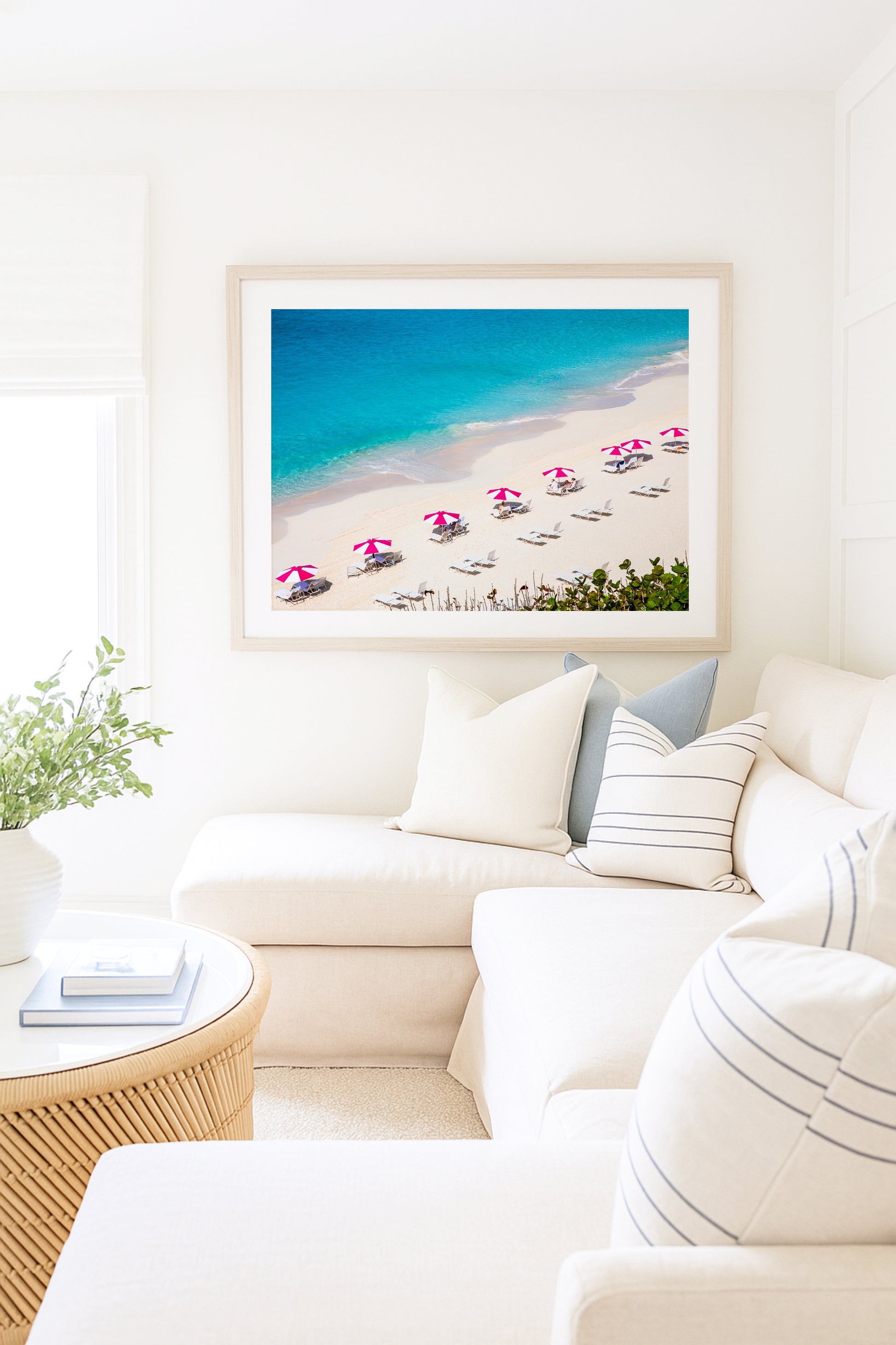 Aerial beach print of pink beach umbrellas at the iconic Reefs Hotel Bermuda with turquoise ocean