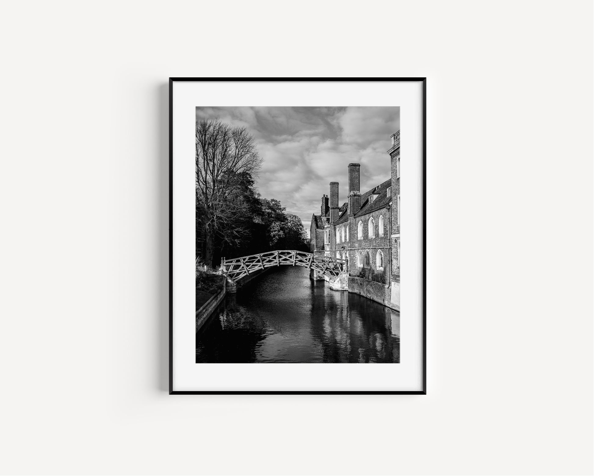 Black and white print of the Mathematical Bridge at the University of Cambridge.