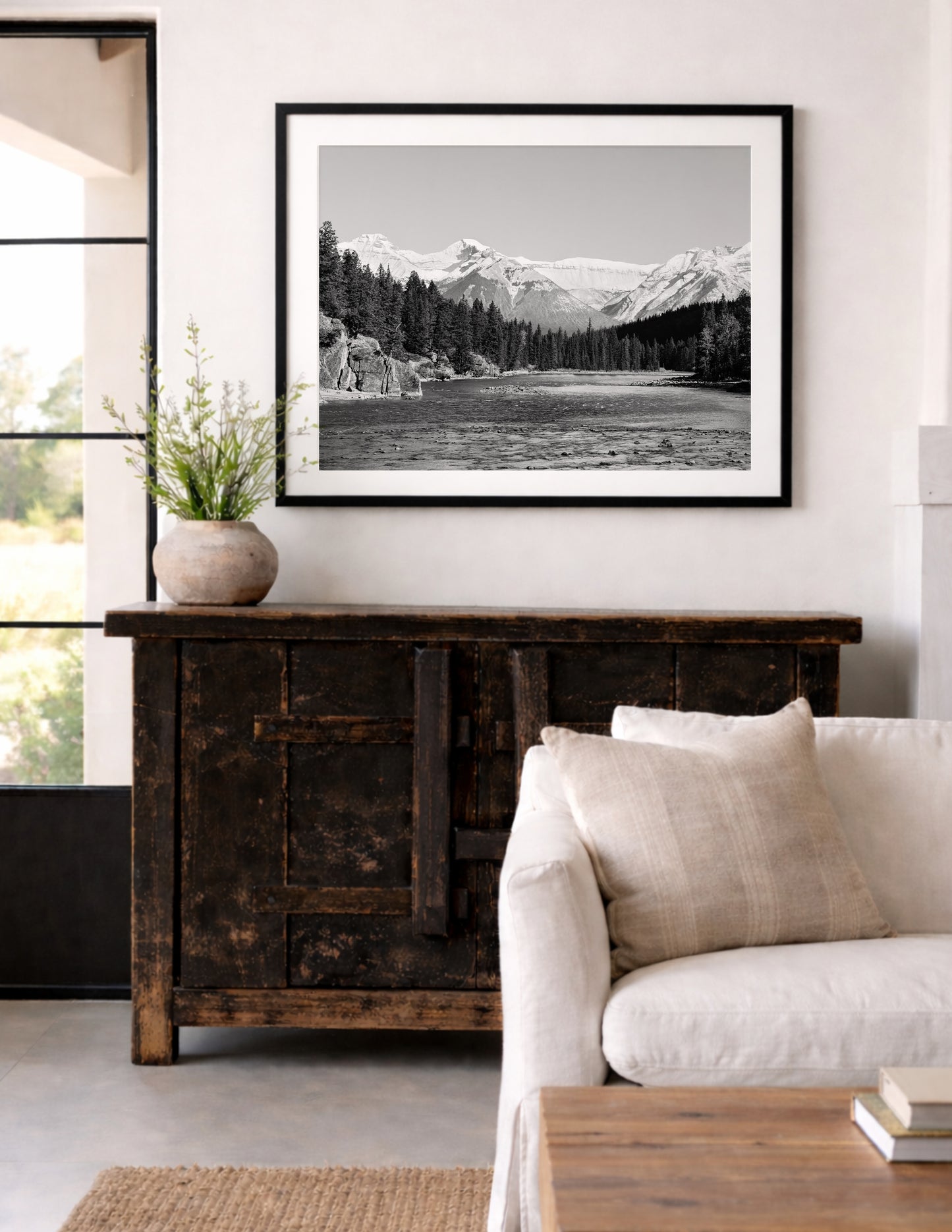 Black and white nature photography from Banff National Park featuring Bow Falls and the Canadian Rockies. Perfect for lodge or mountain house decor.