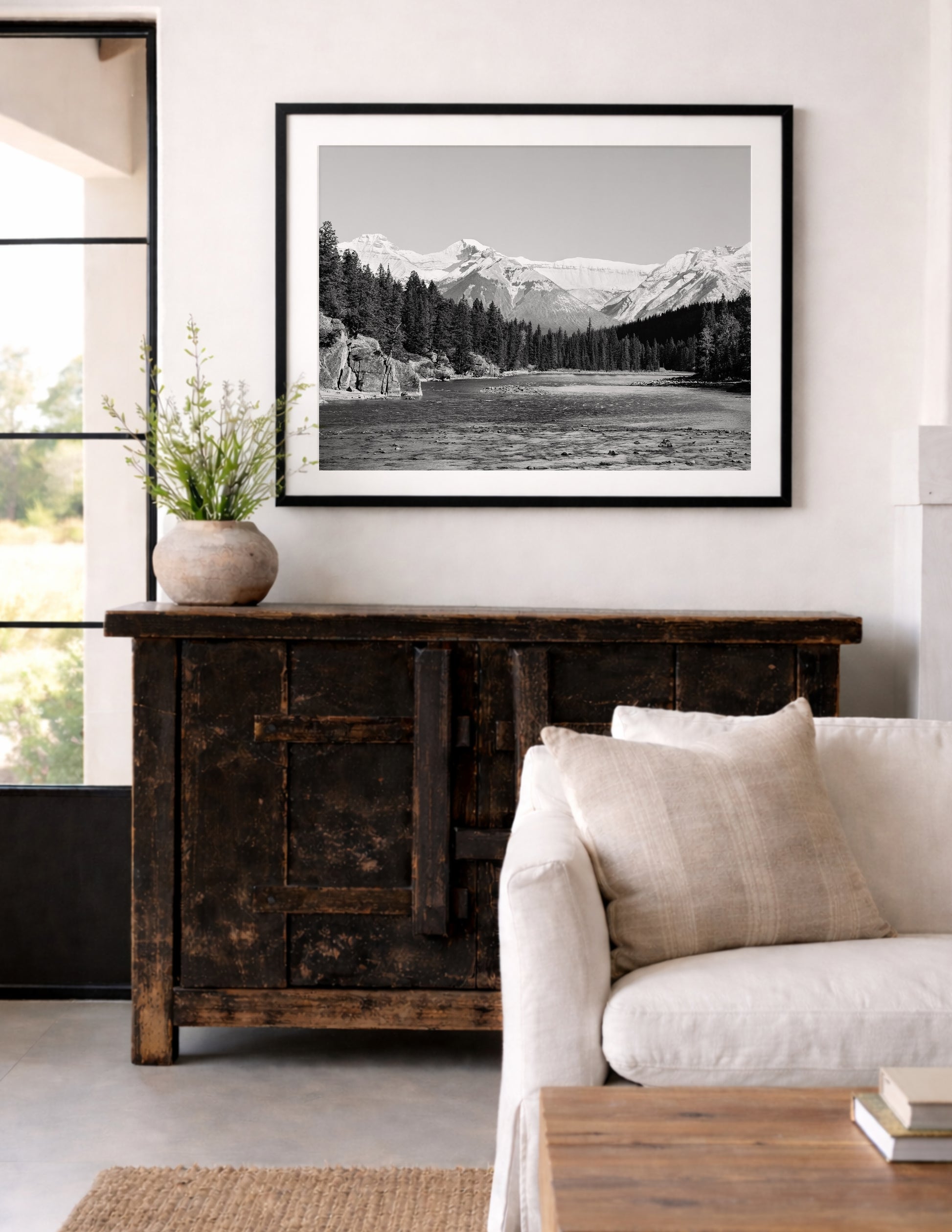 Black and white nature photography from Banff National Park featuring Bow Falls and the Canadian Rockies. Perfect for lodge or mountain house decor.