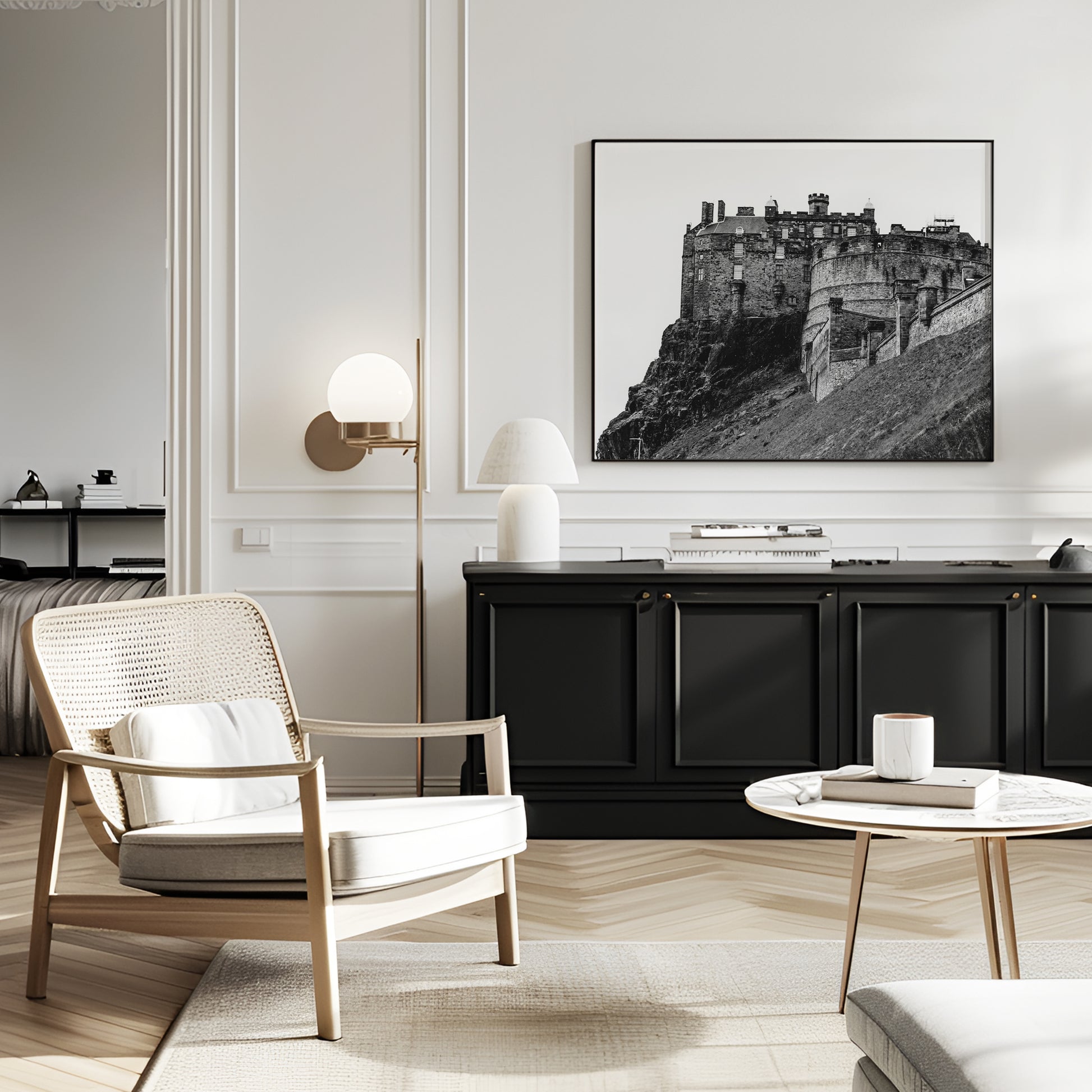 Black and white horizontal photo of Edinburgh Castle in Scotland with stone ramparts and cliffside – moody historic wall art