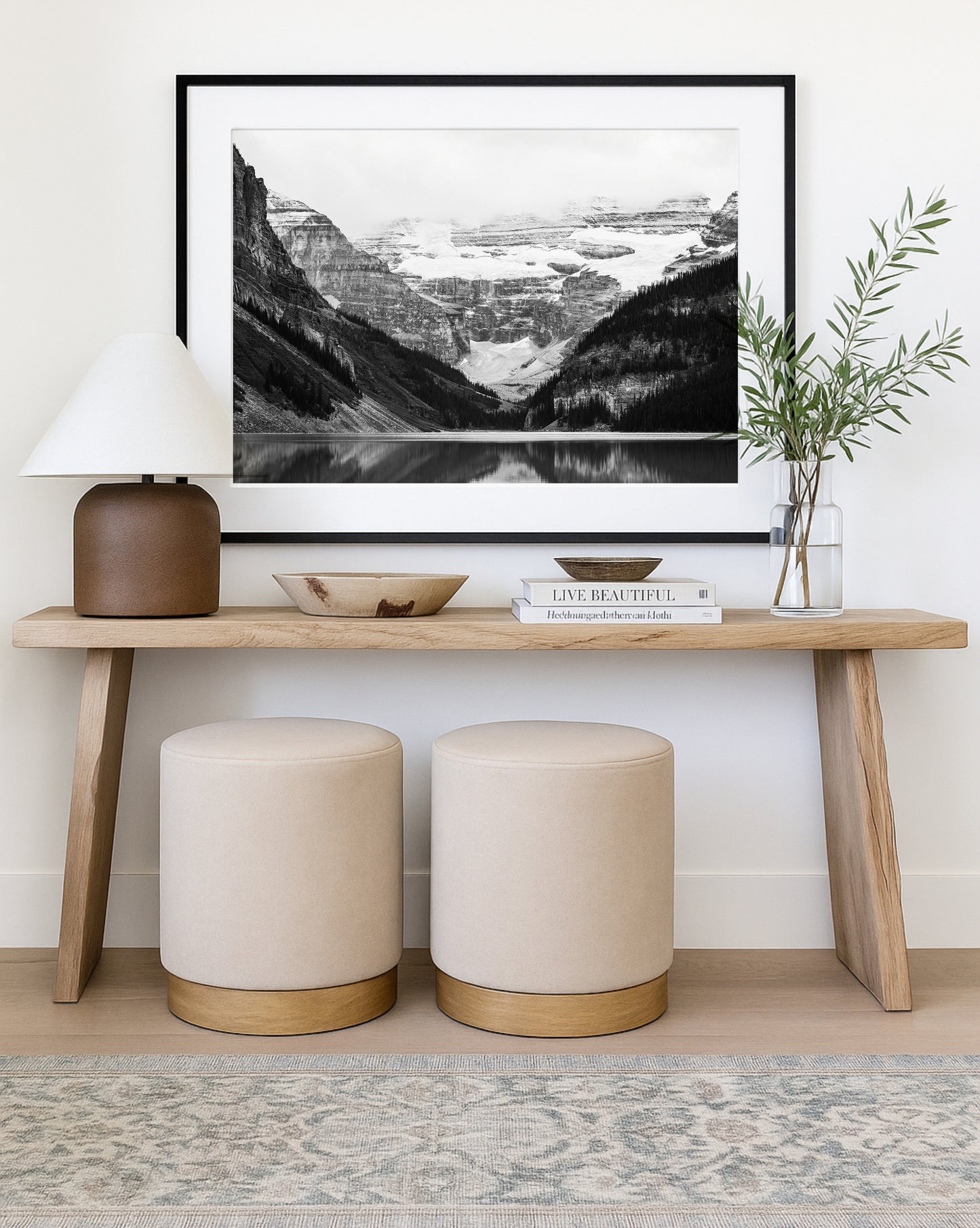Black and white photo of Lake Louise in Banff National Park, Alberta Canada with mountains reflected in the Canadian Rockies