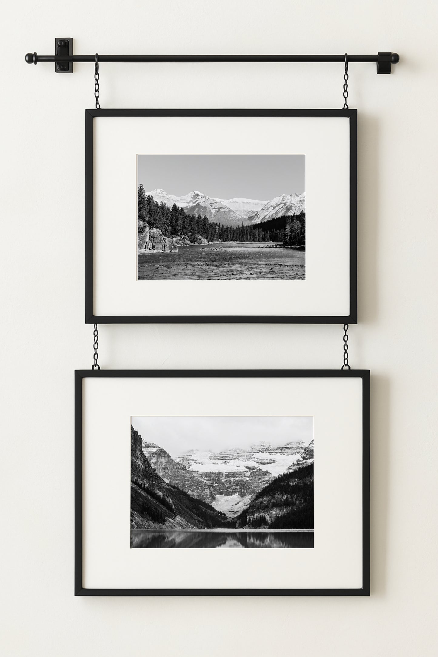 Black and white photo of Lake Louise in Banff National Park, Alberta Canada with mountains reflected in the Canadian Rockies