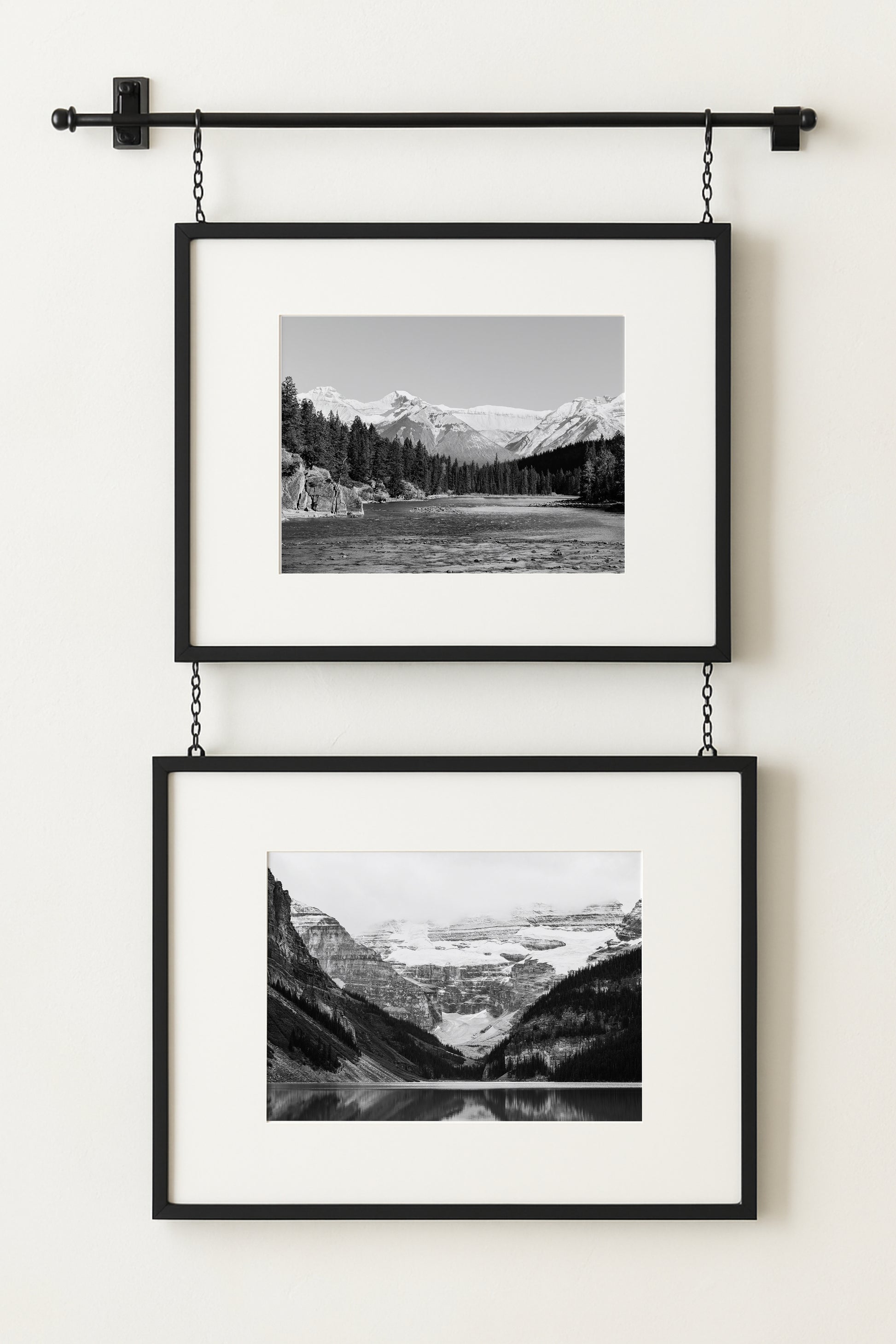 Black and white photo of Lake Louise in Banff National Park, Alberta Canada with mountains reflected in the Canadian Rockies