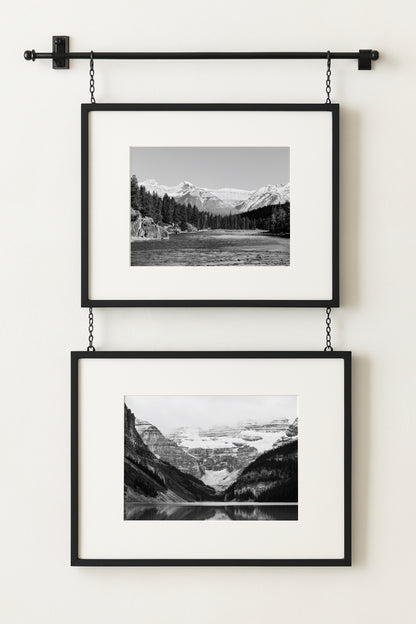 Black and white photo of Lake Louise in Banff National Park, Alberta Canada with mountains reflected in the Canadian Rockies
