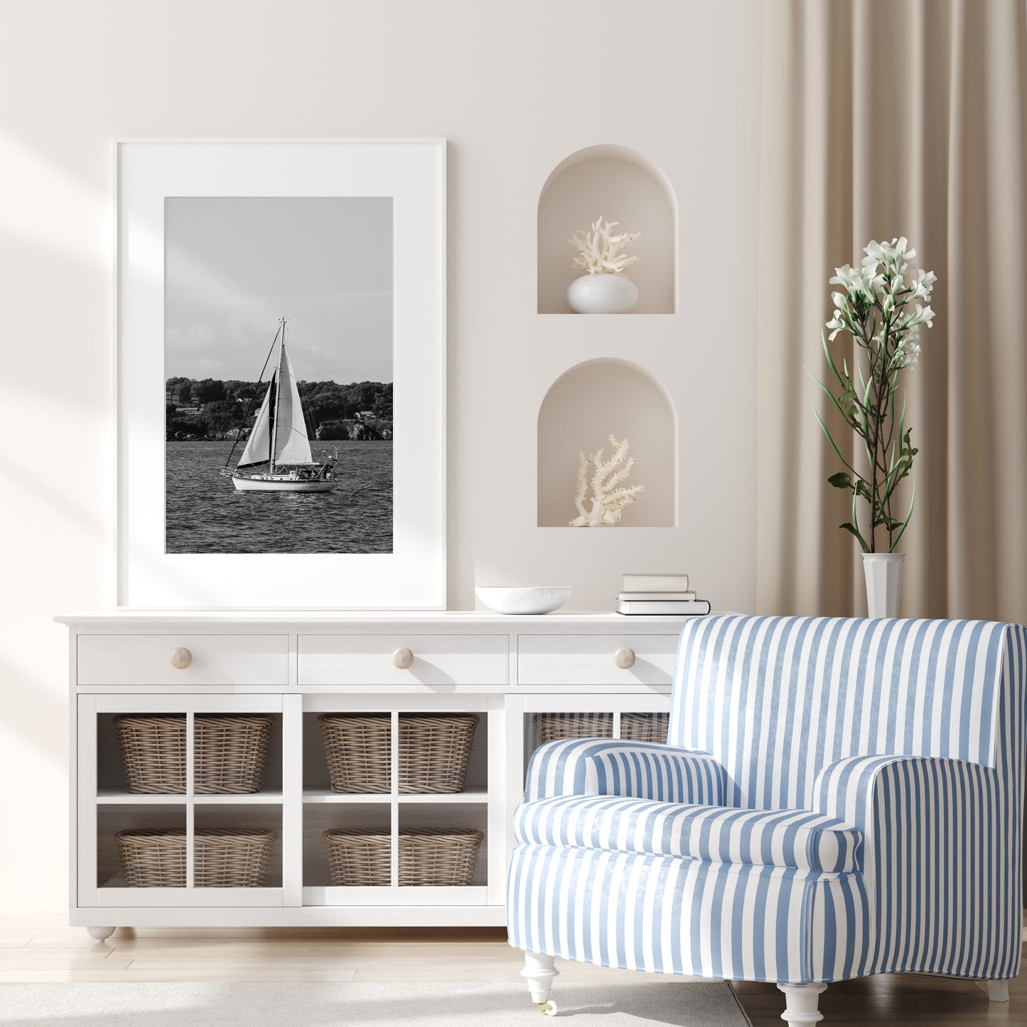 Black and white photo of a sailboat sailing in Newport, Rhode Island, with calm ocean water and soft horizon in the background. Coastal nautical wall art.