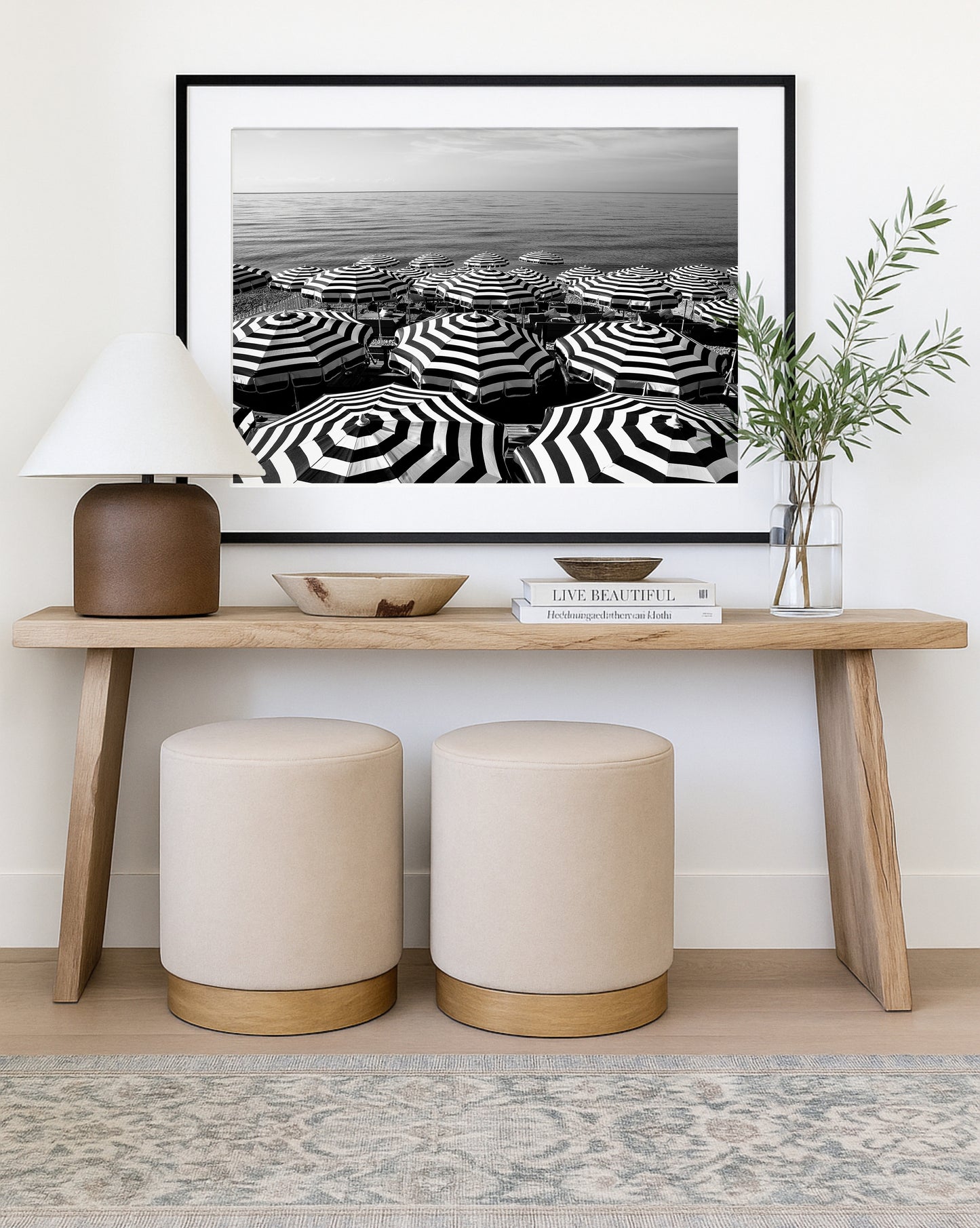 Black and white aerial beach photography print showing striped umbrellas on the French Riviera