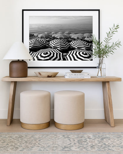 Black and white aerial beach photography print showing striped umbrellas on the French Riviera