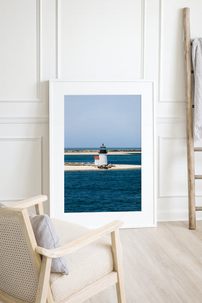 Nantucket Brant Point Lighthouse color photography print — white lighthouse on sandy harbor point, deep blue ocean, coastal New England wall art for beach house or living room