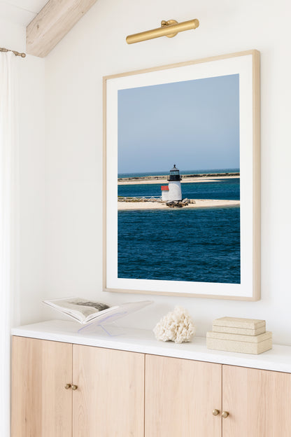 Nantucket Brant Point Lighthouse color photography print — white lighthouse on sandy harbor point, deep blue ocean, coastal New England wall art for beach house or living room