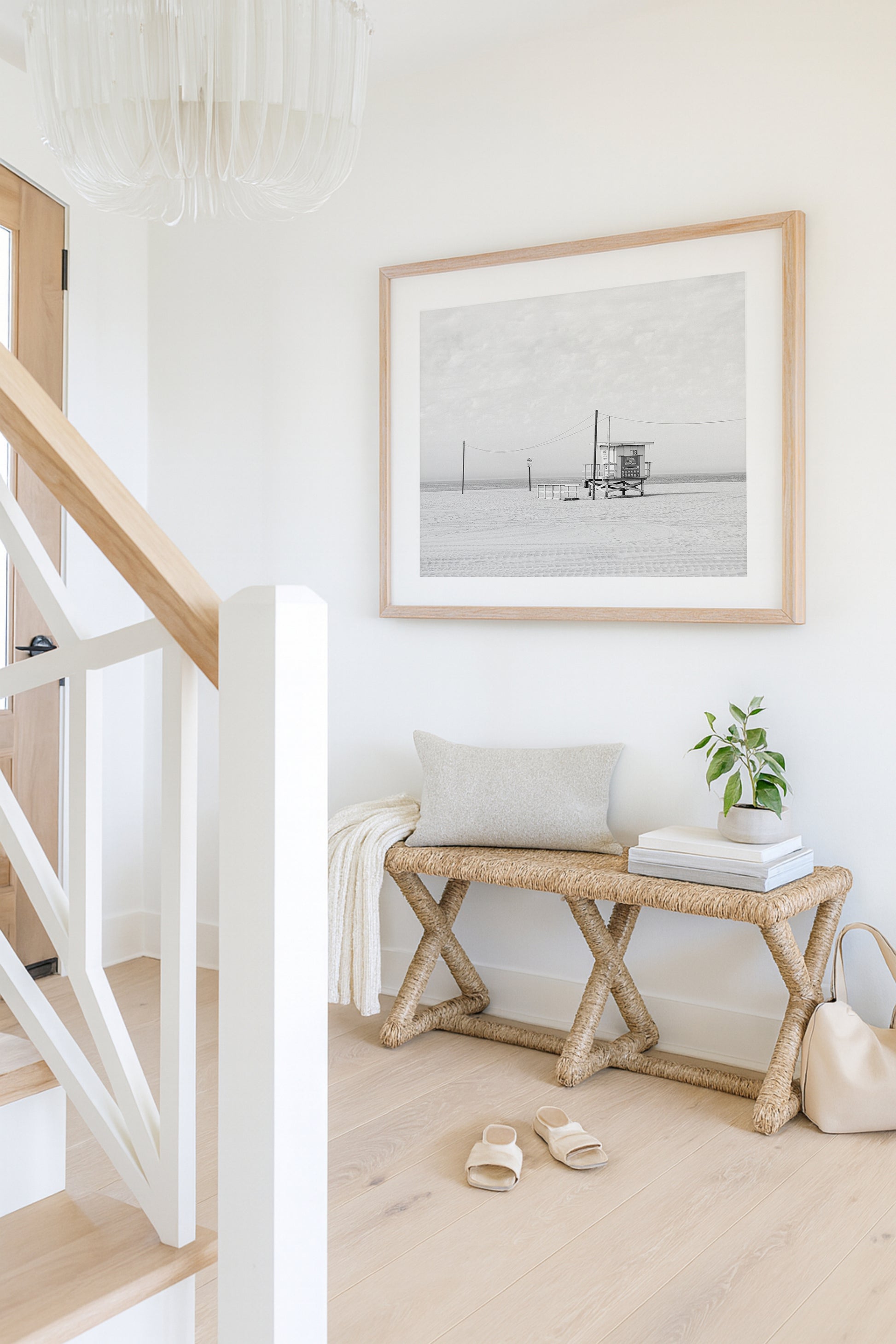 Black and white beach photo of lifeguard tower on California sand – minimalist coastal wall art
