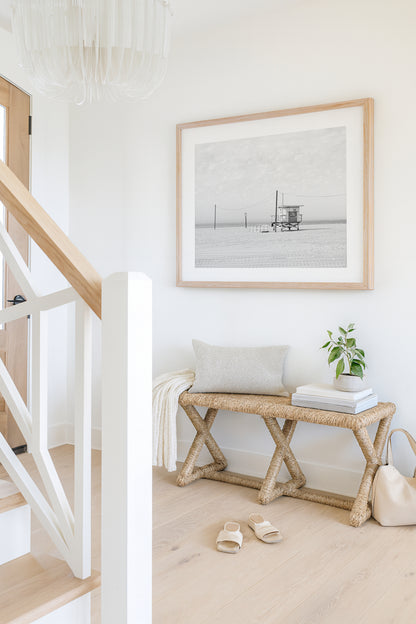 Black and white beach photo of lifeguard tower on California sand – minimalist coastal wall art