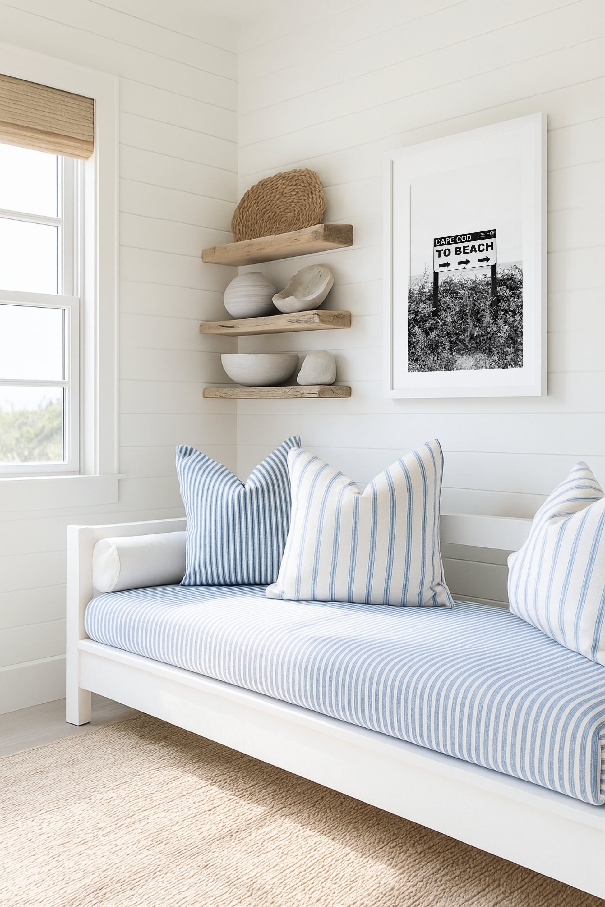 Black and white photography print of a vintage-style sign reading 'Cape Cod Beach This Way' with an arrow, set against a clear sky.