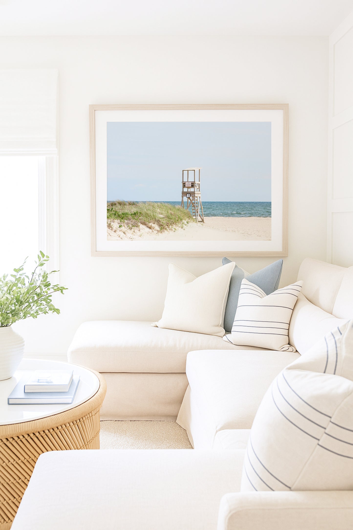 Color fine art photograph of an empty lifeguard stand at Bank Street Beach on Cape Cod — rolling sand dunes, sea grass, and the open Atlantic under a pale summer sky