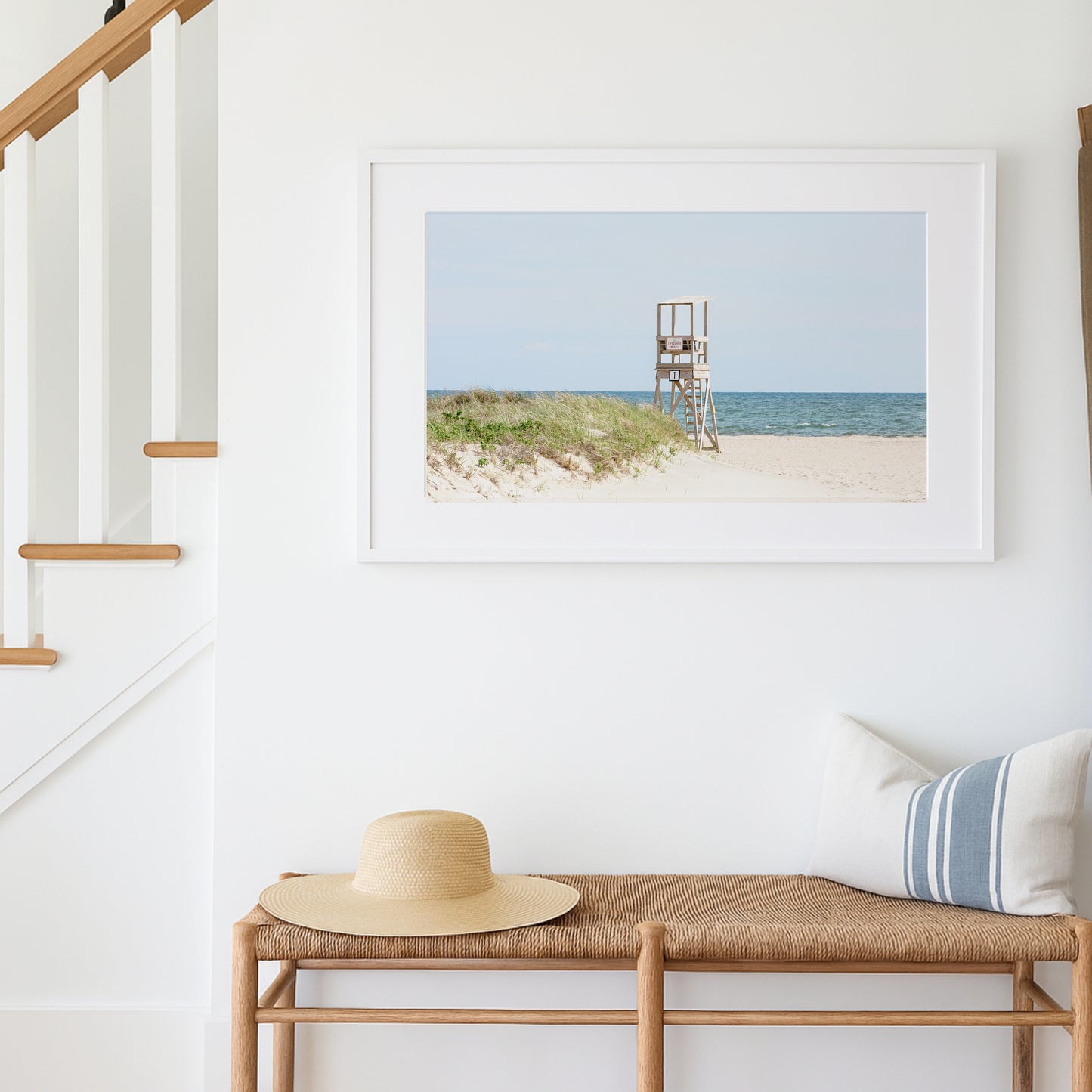 Color fine art photograph of an empty lifeguard stand at Bank Street Beach on Cape Cod — rolling sand dunes, sea grass, and the open Atlantic under a pale summer sky