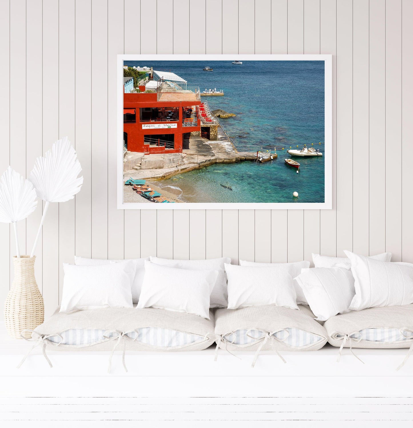 Capri Italy beach club photography featuring striped umbrellas and terraces.