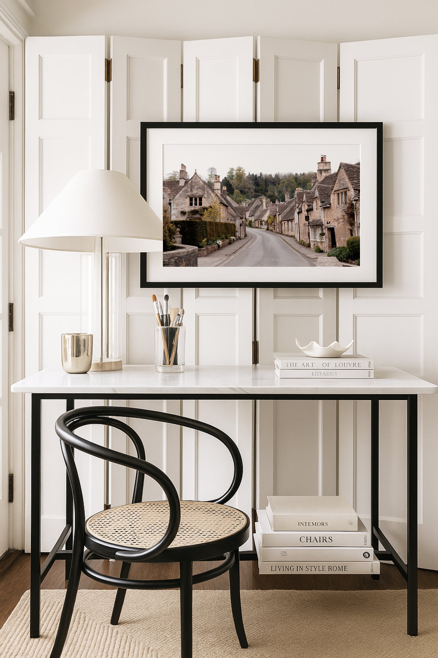 Photography print of Castle Combe village in the Cotswolds England featuring historic stone cottages and winding road
