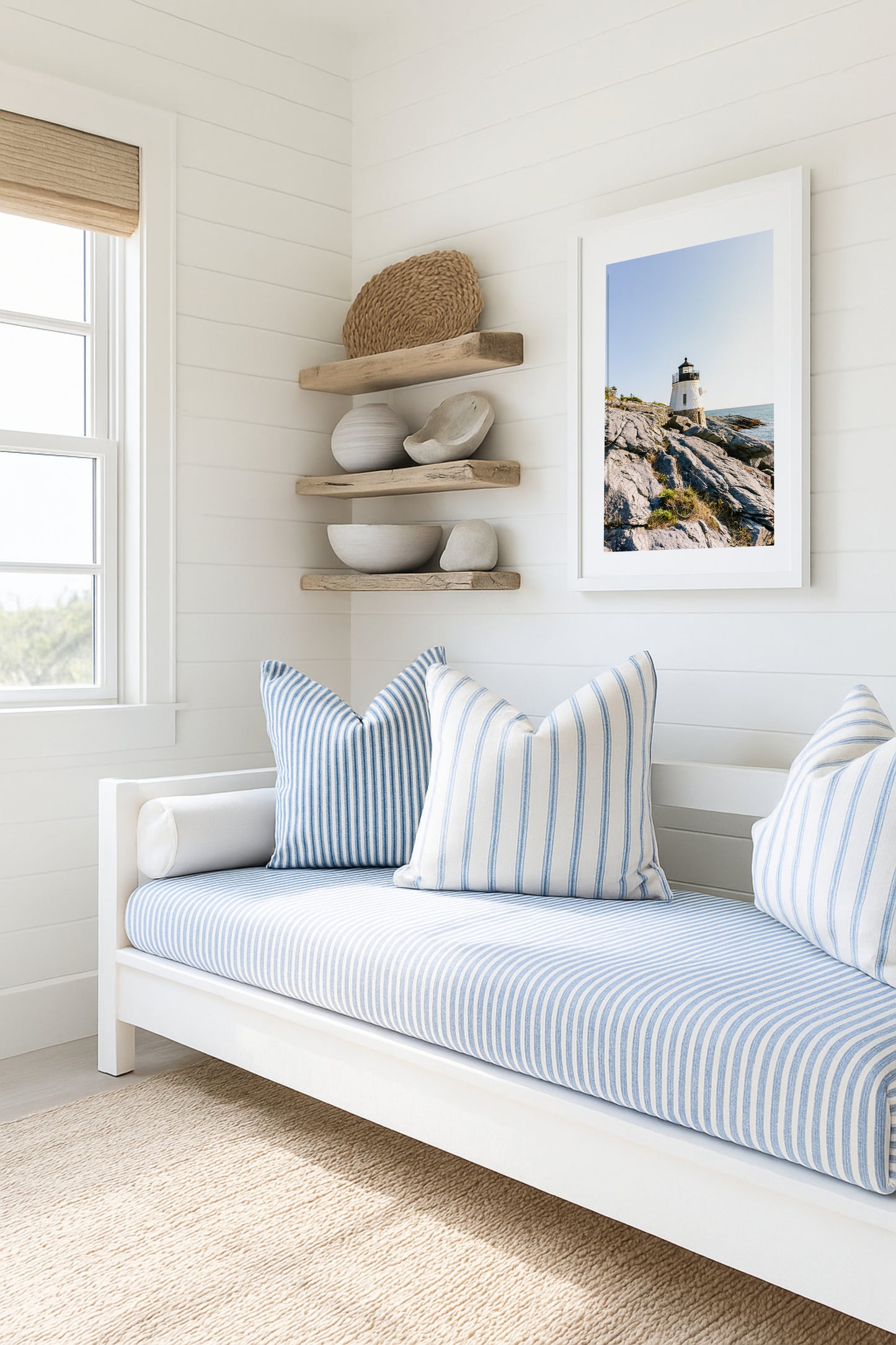 Castle Hill Lighthouse perched on rocky Rhode Island coastline under a clear sky, captured in golden hour light – Newport RI photo print for beach and coastal decor.