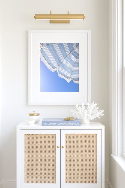 Blue and white beach umbrella print photographed in Santa Barbara Cali against clear blue sky