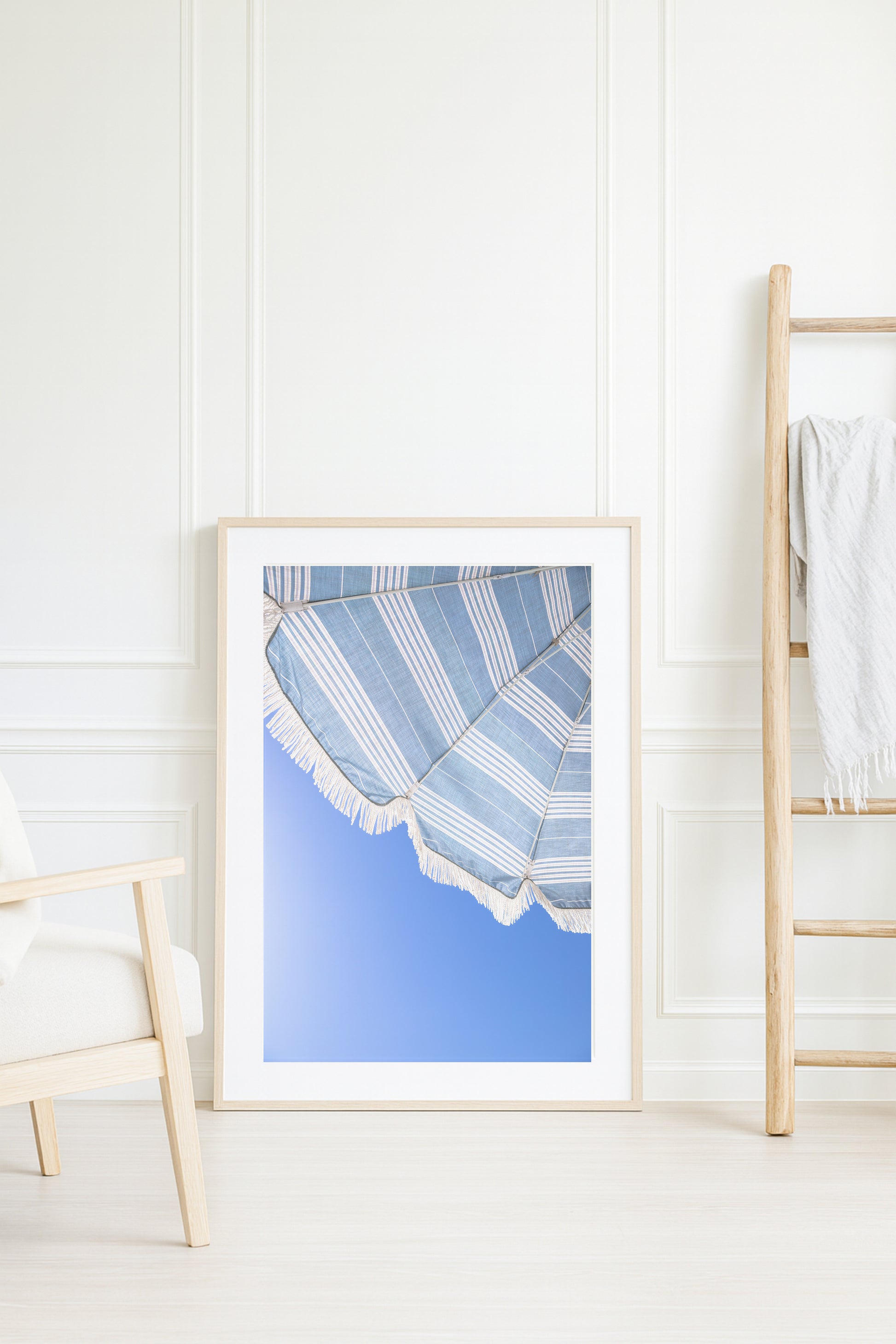 Blue and white beach umbrella print photographed in Santa Barbara Cali against clear blue sky