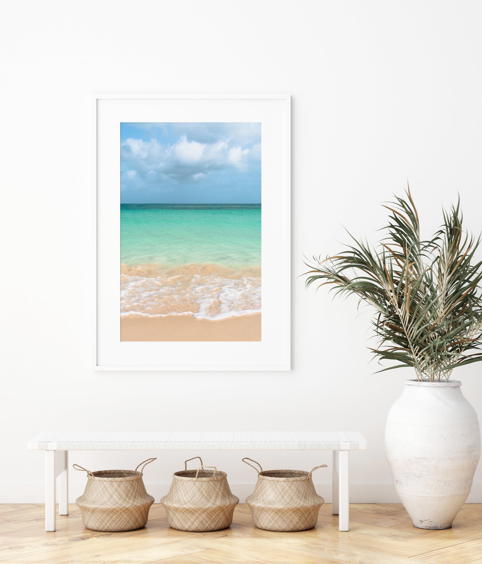 Vibrant ocean waves at Eagle Beach, Aruba with clear turquoise water and soft golden sand under a bright sky — colorful beach photography perfect for tropical and modern coastal decor.