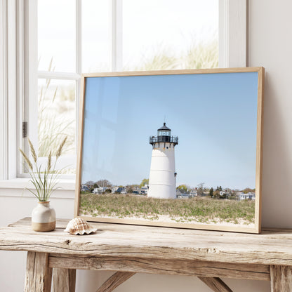 Horizontal coastal photography print of Edgartown Lighthouse on Marthas Vineyard with dune grass, blue sky, and beach landscape.