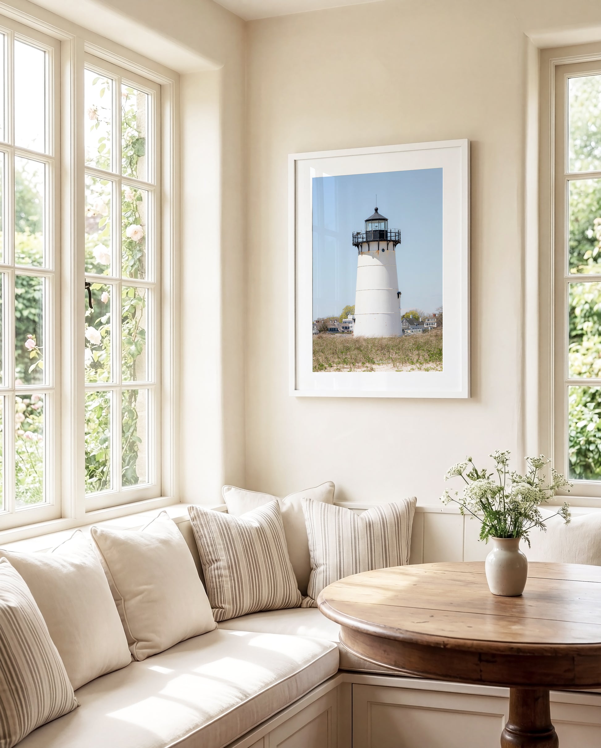 Edgartown Lighthouse photography print on Marthas Vineyard featuring a white lighthouse, dune grass, and soft blue sky in a coastal New England setting.