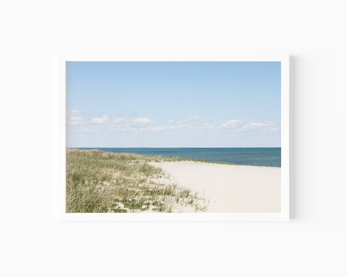 Neutral Marthas Vineyard beach print featuring sandy dunes, beach grass, soft blue ocean water, and a bright coastal sky.