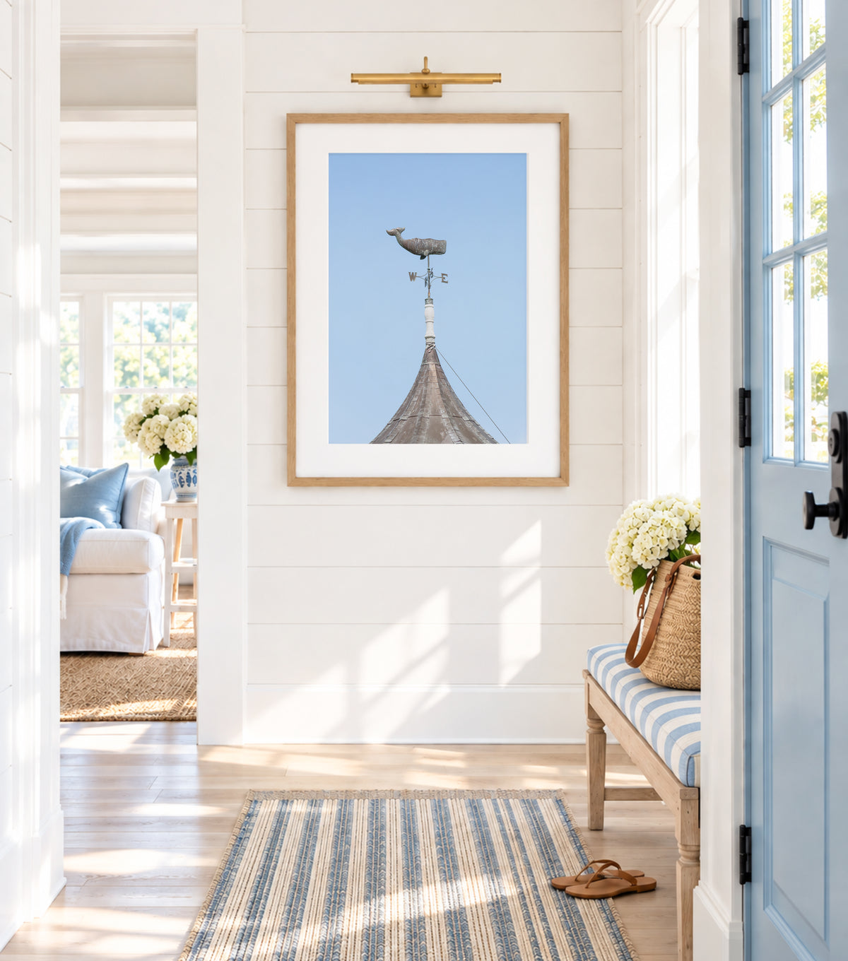 Whale weathervane Martha’s Vineyard photography print, weathered nautical weathervane on copper rooftop against pale blue sky, New England coastal wall art for beach house, cottage, or living room
