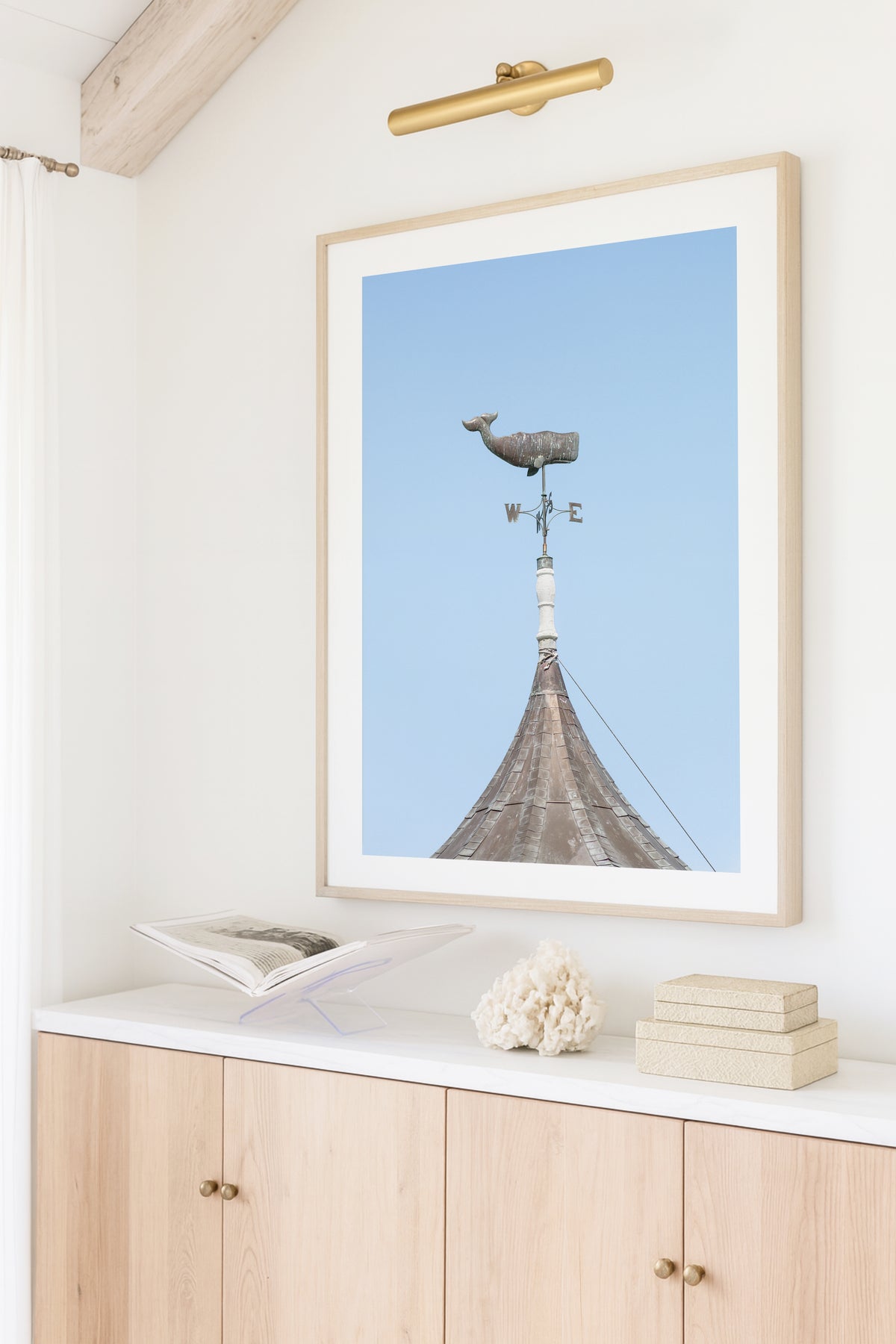Whale weathervane Martha’s Vineyard photography print, weathered nautical weathervane on copper rooftop against pale blue sky, New England coastal wall art for beach house, cottage, or living room