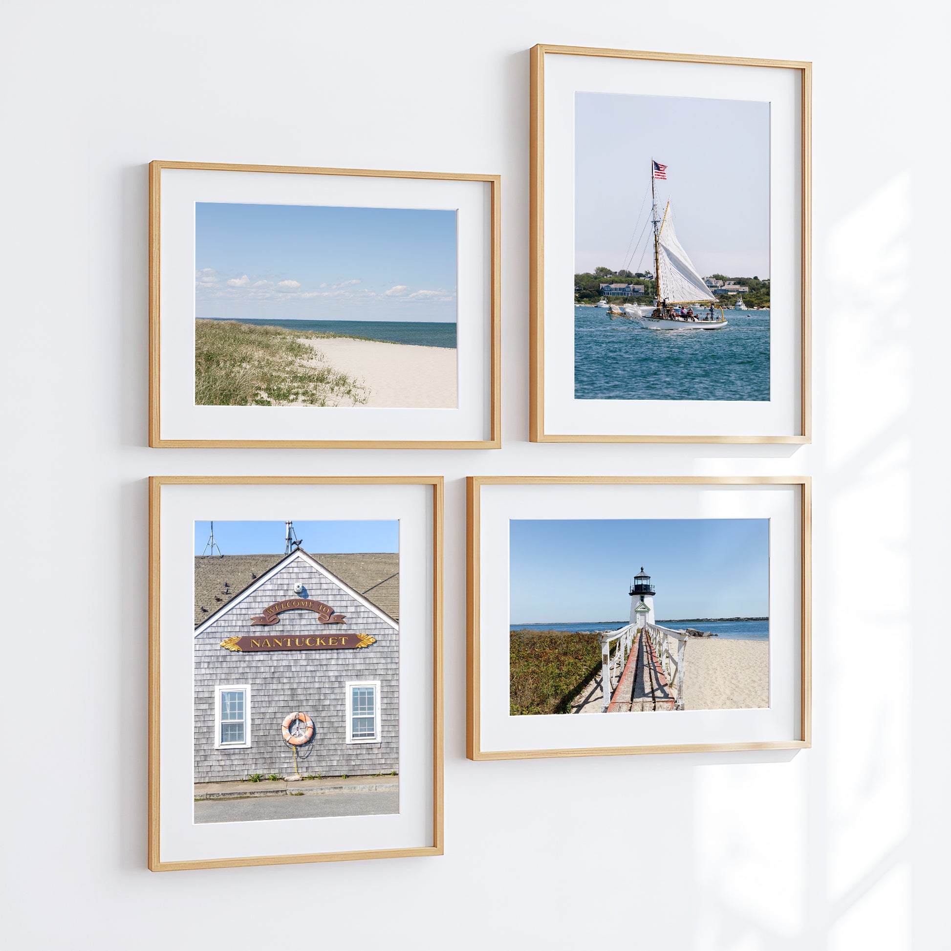 Traditional sailboat sailing in Nantucket, Massachusetts with an American flag flying, photographed along the New England coast.