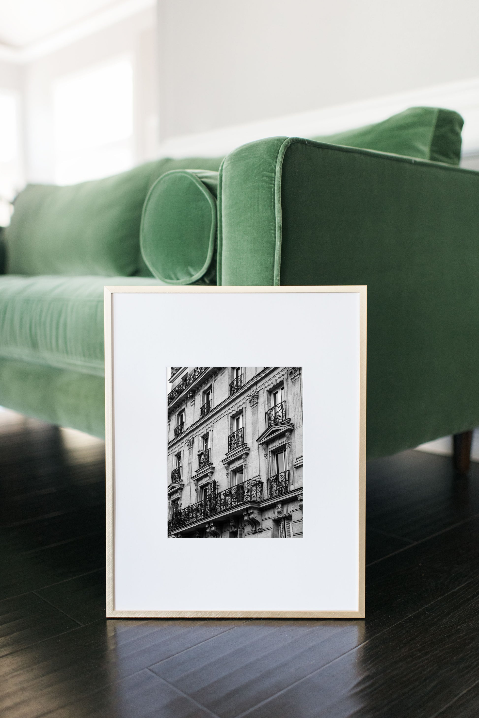 Black and white photo of French balcony with ornate railings in Paris