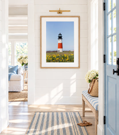 Color fine art photograph of Sankaty Head Lighthouse on Nantucket Island with yellow daffodils in soft focus in the foreground — spring wall art from Siasconset, Nantucket