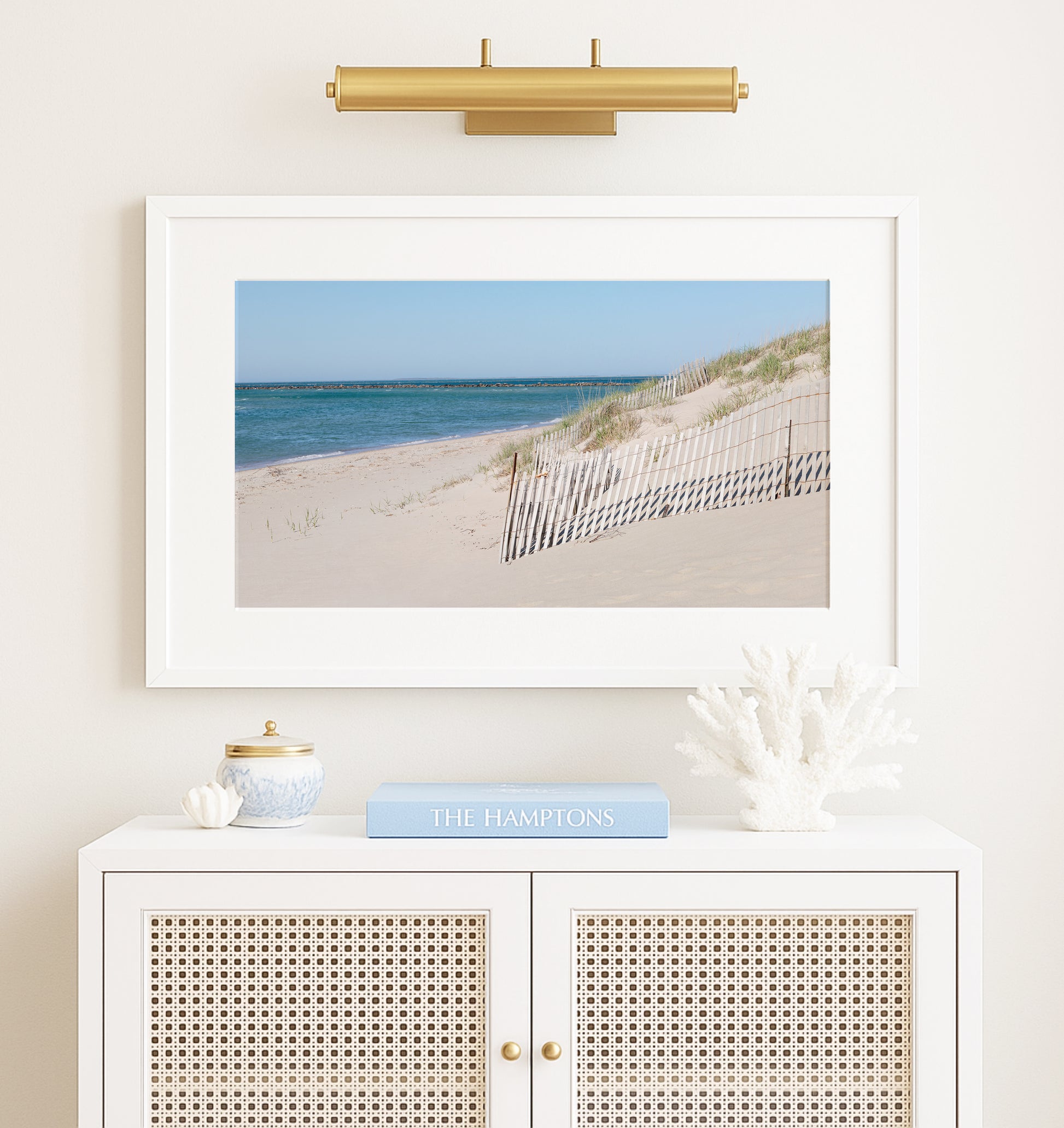 Horizontal beach photography print of Steps Beach on Nantucket Island with sand dunes, beach fencing, and blue ocean water.