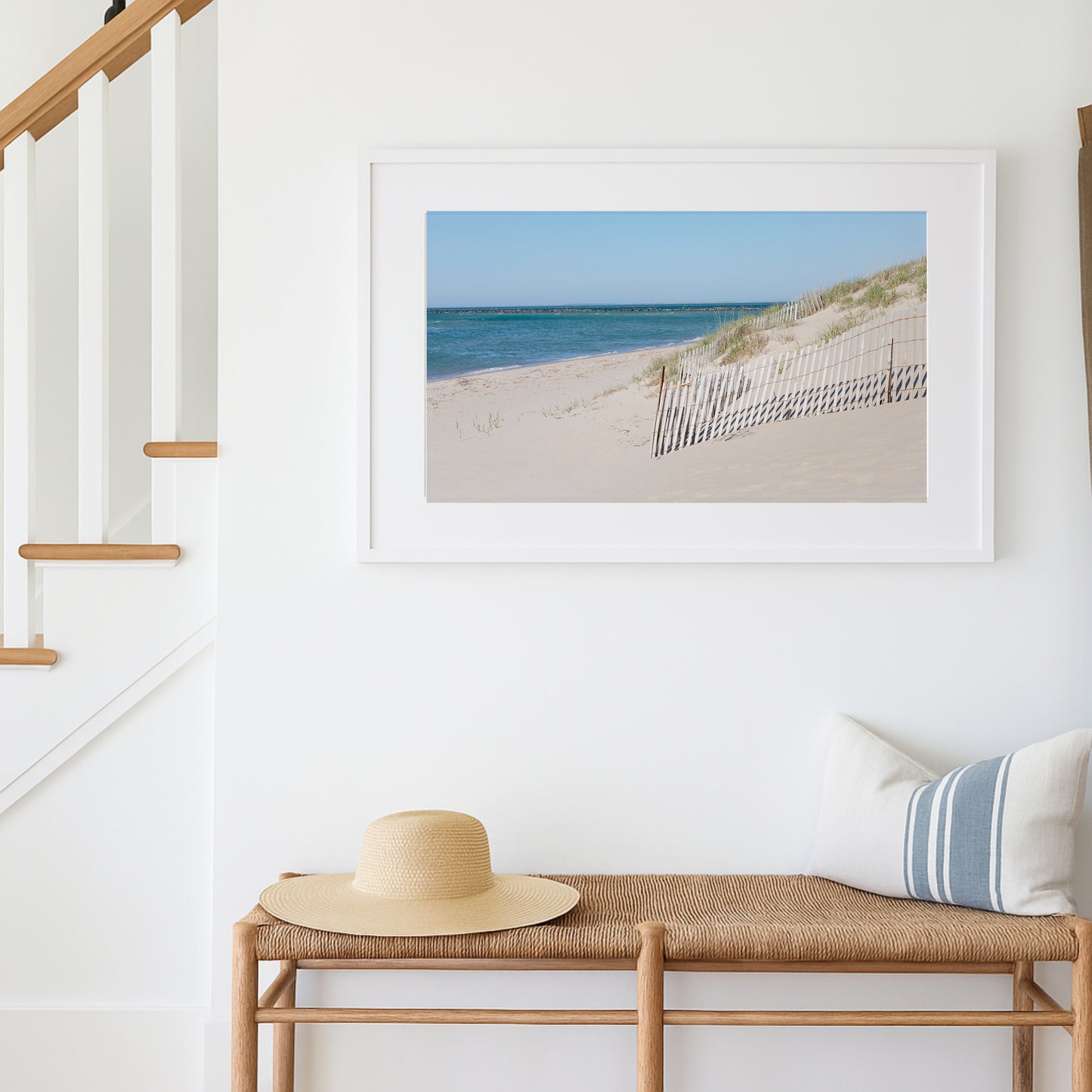 Horizontal beach photography print of Steps Beach on Nantucket Island with sand dunes, beach fencing, and blue ocean water.