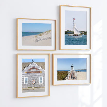 Horizontal beach photography print of Steps Beach on Nantucket Island with sand dunes, beach fencing, and blue ocean water.