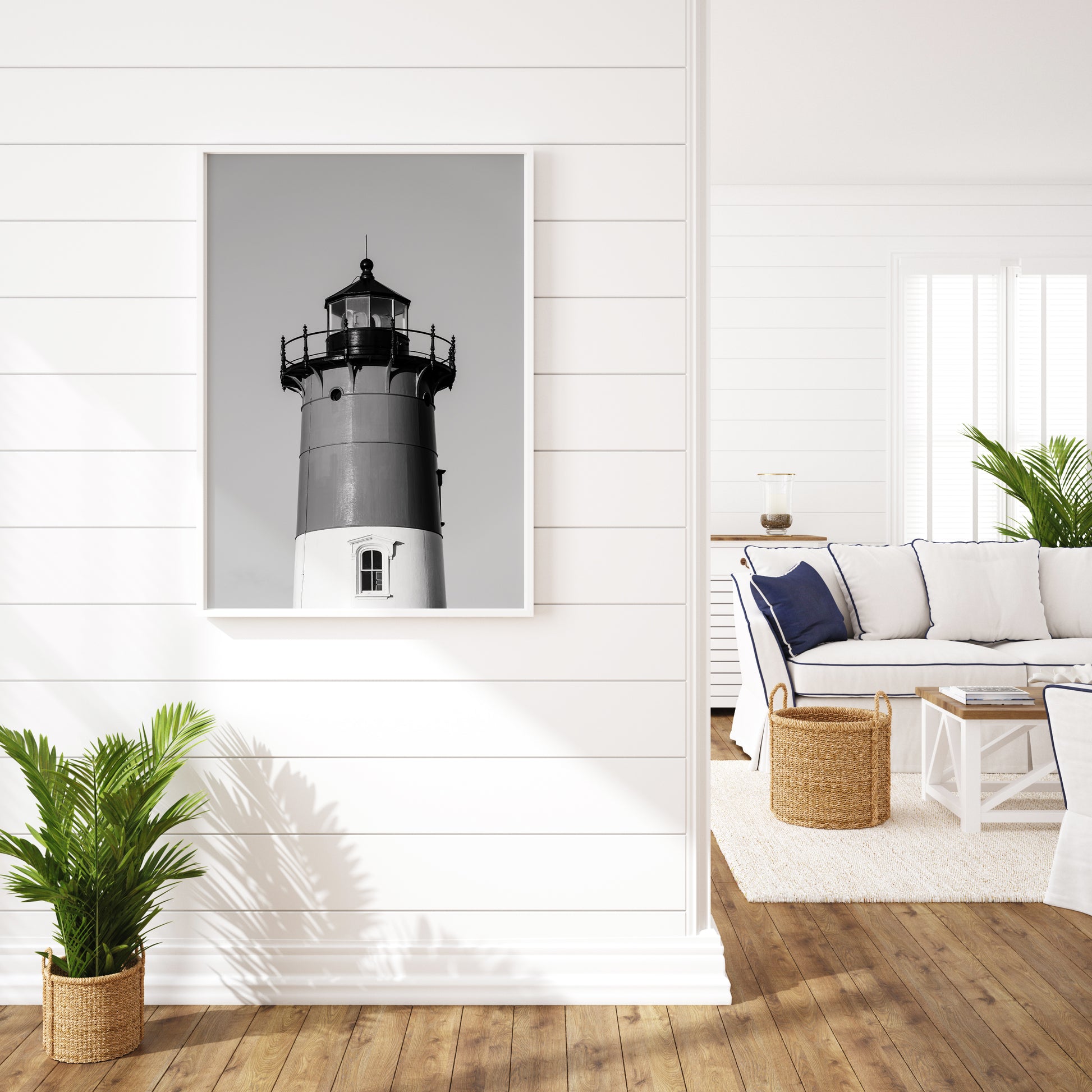 Black and white photograph of Nauset Lighthouse in Eastham, Massachusetts, featuring the iconic tower set against a pale sky. A minimalist coastal print ideal for Cape Cod–inspired decor and nautical wall art.