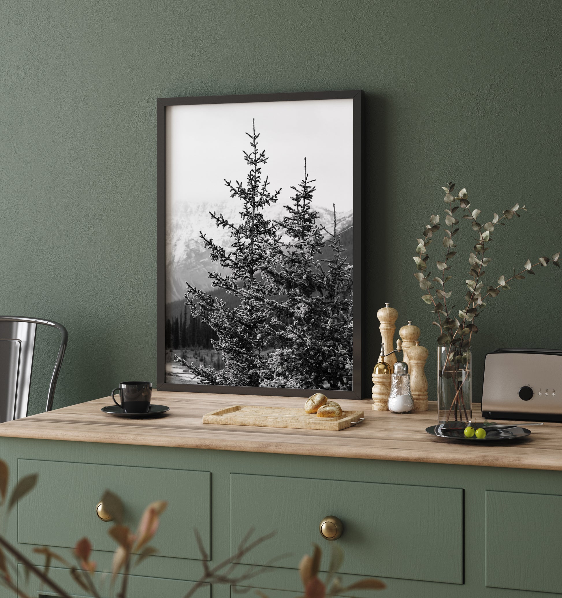 Black and white photo of a pine tree with snow-dusted branches in Banff National Park, Alberta – minimalist Canadian Rockies nature photography.